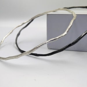 Minimalist silver bangle, hammered in an irregular shape both in sterling and oxidized silver S28.