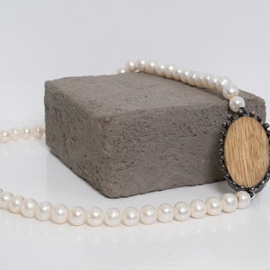 Wooden charm tied with oxidized silver on a freshwater pearl necklace, Wooden Charm, Pearl Statement Necklace. image 3
