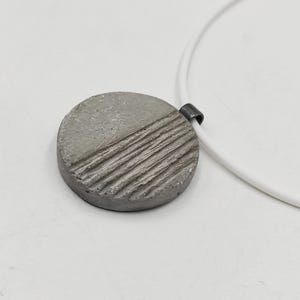 Handmade Concrete Pendant Necklace Oxidized Silver & Rubber Cord Architectural Jewelry.