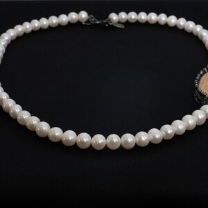 Wooden charm tied with oxidized silver on a freshwater pearl necklace, Wooden Charm, Pearl Statement Necklace. image 2