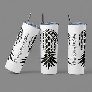 May include: Three stainless steel tumblers with a black and white pineapple design. The pineapple is a stylized American flag with a green stripe down the middle. The tumblers have the text "Please Well With Others" on the side.