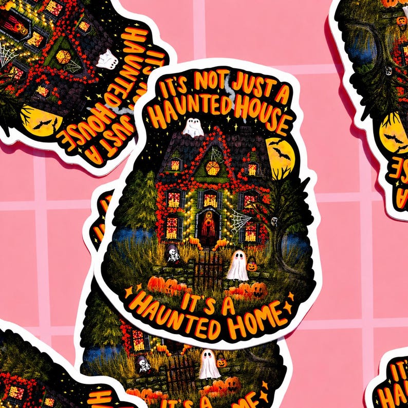 May include: A sticker featuring a spooky haunted house illustration. The house is decorated with lights, pumpkins, and ghosts. Text on the sticker reads "It's Not Just a Haunted House, It's a Haunted Home."