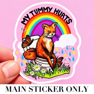 May include: A die-cut sticker featuring a brown fox sitting on a white toilet with the text MY TUMMY HURTS in black letters. The design includes a colorful rainbow, orange butterflies, white daisy flowers with faces, bubbles, and yellow stars.