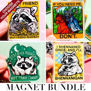 May include: A collection of raccoon-themed magnets with humorous text. The magnets feature colorful illustrations of raccoons in various poses, with phrases like "Why friend shaped?" and "If you need me, don't."