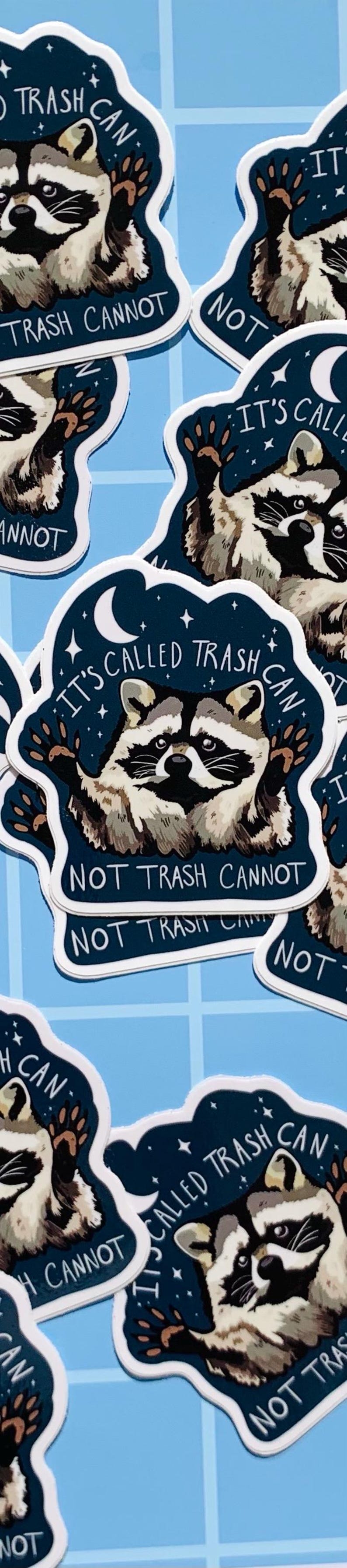 May include: A set of five stickers featuring a raccoon with a starry night background. The raccoon is holding up its paw and the text reads "It's called trash can, not trash cannot".