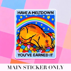 Puede incluir: Una pegatina con un gato de dibujos animados naranja, acostado sobre una cama colorida. La pegatina tiene un borde azul y presenta un arco&iacute;ris, estrellas y el texto "HAVE A MELTDOWN YOU'VE EARNED IT".