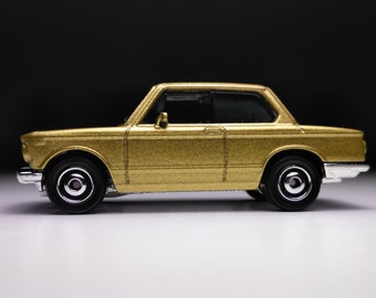 BMW 2002 Matchbox (Custom plastic wheels)