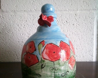 Oil dispenser with poppies