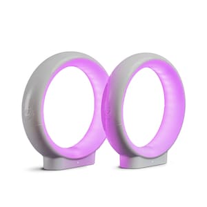 May include: Two white ring-shaped lamps with a purple glow. The lamps have a circular base and a ring-shaped light that emits a soft purple light.