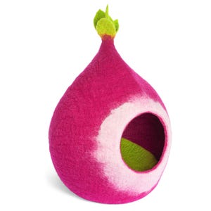 May include: A teardrop-shaped pet cave made of felted wool in a vibrant magenta colour. The structure features a circular opening with a light pink border, revealing a bright lime green interior floor and a small green leaf accent at the top.