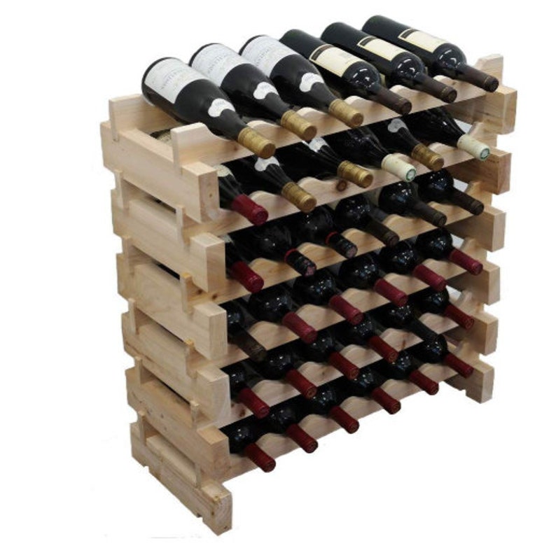 May include: A wooden wine rack with multiple shelves, each holding rows of wine bottles. The rack is made of natural wood and has a rustic appearance.