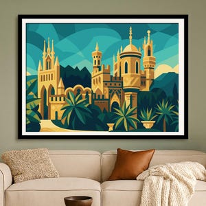 May include: A framed art print featuring a stylized illustration of a castle with multiple towers and domes. The artwork uses a palette of gold, teal, and green, with palm trees in the foreground and mountains in the background. The print is displayed above a beige sofa.