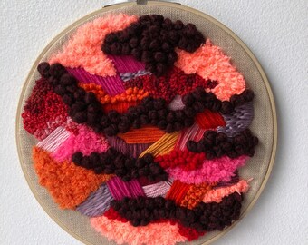 Embroidery made by hand, pink, orange and brown. Bohemian style decoration created in Quebec. Abstract and unique work.