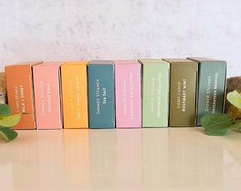 May include: A set of ten colorful shower steamers with different scents, including milk and honey, coconut rose, sweet orange jasmine, sea salt, lavender eucalyptus, peppermint eucalyptus, rosemary mint, and intergreen menthol.