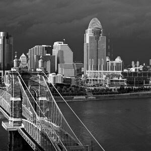 Black and White Photography, Cincinnati and Roebling Bridge in stormy weather.