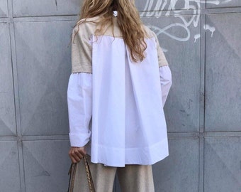 Conjunto deportivo y elegante de dos piezas para mujer: suéter de lana y algodón y pantalones de pierna ancha.