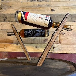 Floating stave wine / whiskey holder