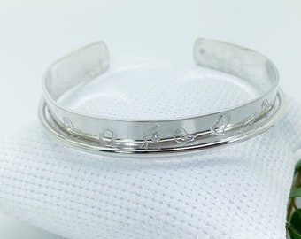 Mockingbird song cuff bracelet in sterling silver.