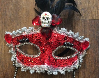 Red Mask with Black Feathers, Hearts, and Day of the Dead Skull Accesories