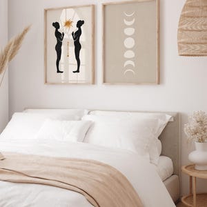 May include: Two black silhouettes of people standing facing each other with their hands raised in a prayer position. The background is a light beige with a gold sun and a window. The second image is a light beige background with a white moon phases design.