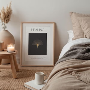 May include: A framed print with a black background and gold geometric design. The print has the word "HEALING" in white text at the top and a quote about the art of making peace with yourself at the bottom.