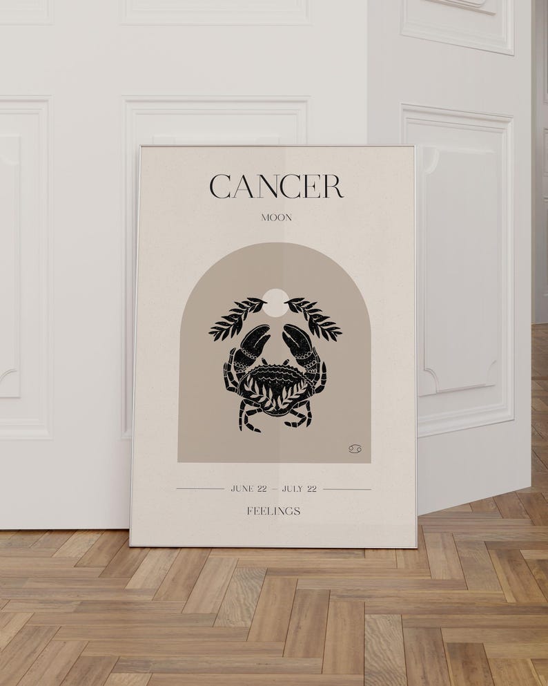 May include: A beige and black minimalist poster with the text "CANCER MOON" at the top. The poster features a black crab illustration with leaves and a crescent moon in an arch shape. The text "JUNE 22 - JULY 22 FEELINGS" is at the bottom of the poster.