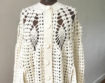 70’s hand crochet cape. White synthetic.