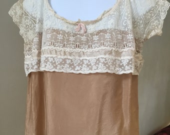 Antique lace corset cover/ blouse hybrid with added beige silk .