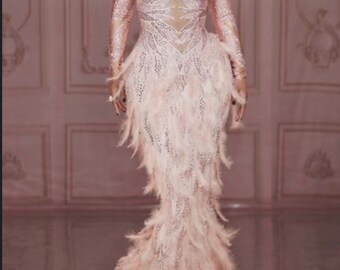 formal gown with feathers