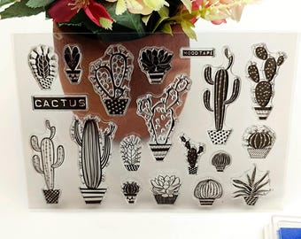 May include: Clear acrylic stamp set featuring various cactus designs in black and white. The word "CACTUS" is printed on a rectangular label. Includes images of cacti in pots and individual cactus plants.