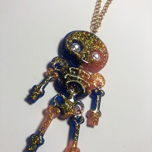 Blue and Pink Gold Glitter Spooky Skeleton Keychain