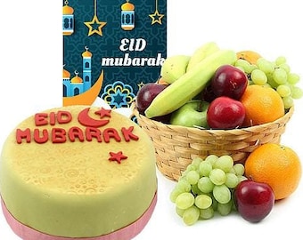 Frutas de gala de Eid con pastel y tarjeta