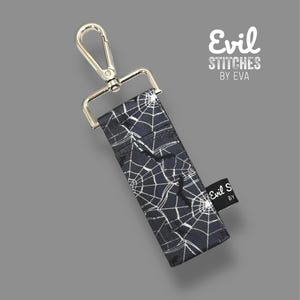 Spiders & Webs Printed Seatbelt Chapstick Holders