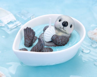 Sea Otter Holding Sea Shell Scented Candle |