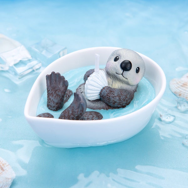 Sea Otter Holding Sea Shell Scented Candle |