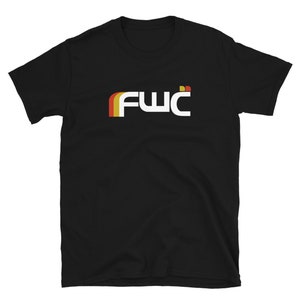 May include: Black t-shirt with a white "FWC" logo in a retro rainbow design.