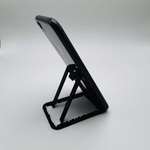 Suporte de telefone ultraleve do tamanho de um cartão de crédito