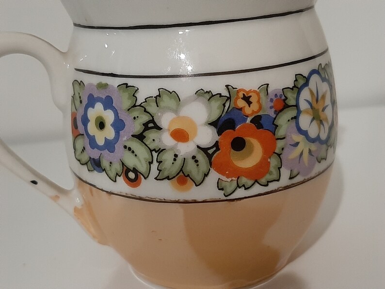 Creamer lusterware white porcelain with black & multi-color floral band/ trim, iridescent tan bottom band. Czecho-Slovakia. Vintage 1950s. image 6