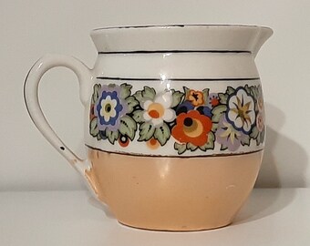 Creamer - lusterware white porcelain with black & multi-color floral band/ trim, iridescent tan bottom band. Czecho-Slovakia. Vintage 1950s.