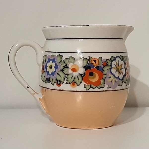 Creamer - lusterware white porcelain with black & multi-color floral band/ trim, iridescent tan bottom band. Czecho-Slovakia. Vintage 1950s.