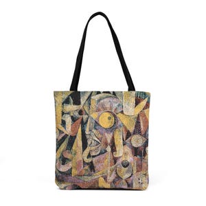 以下が含まれることがあります： 黄色、茶色、黒の色合いの抽象的な幾何学模様が特徴のトートバッグ。アートワークには、目や顔に似た形が含まれています。バッグは黒いハンドルと長方形の形をしています。