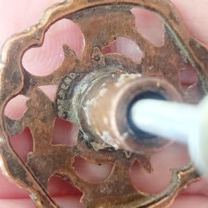 Runde Messingknöpfe und Griffe, Schriftrollenmuster, einzigartige Designs, verschiedene Marken Bild 7