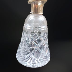 Solid silver topped, art deco, cut glass crystal scent bottle