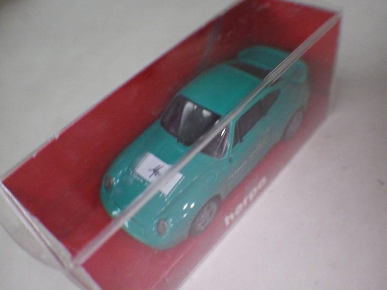 Germany Herpa Turquoise Porsche 911 Carrera Coupe 993 Meryl Sponsor 1:87 NIB
