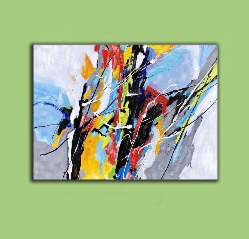 May include: Abstract painting with bold strokes of black, red, yellow, blue, and white paint on a canvas.