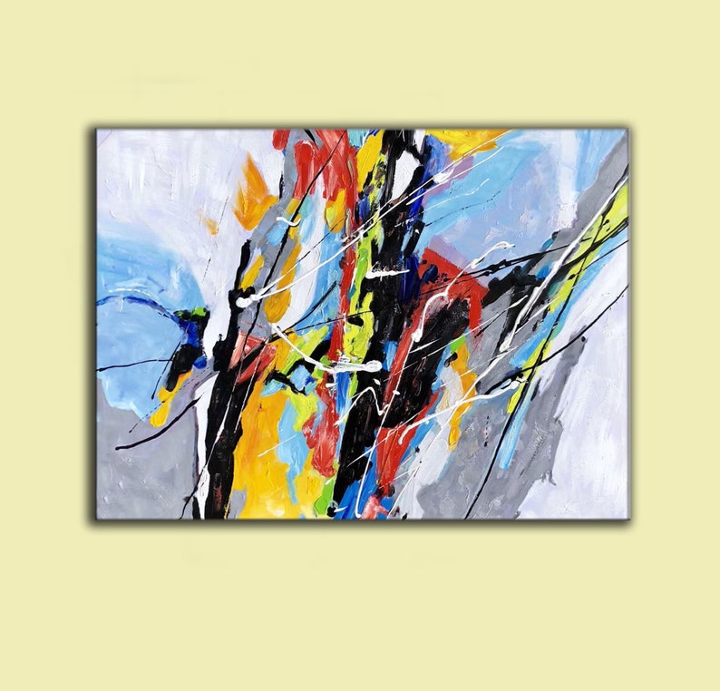May include: Abstract painting with bold strokes of black, red, yellow, blue, and white paint on a gray background.