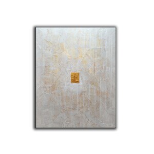 May include: A rectangular wall art piece featuring a heavily textured white surface with raised, wavy, horizontal lines. The centre of the composition contains two small, adjacent, metallic gold rectangular blocks with a rough, uneven finish.