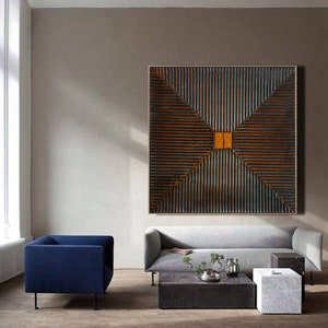 May include: Abstract geometric wall art with a dark brown and orange color scheme. The artwork features a series of intersecting lines creating a diamond shape in the center.