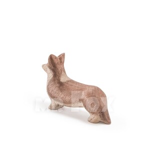 carved corgi figure
