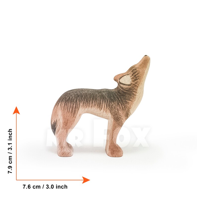 Wooden coyote figurine. Standing posture. Head up. Realistic yet artistic design. Painted subtly in the palette of nature. Feels warm, smooth and tactile in the hand. Made of sturdy beech wood.